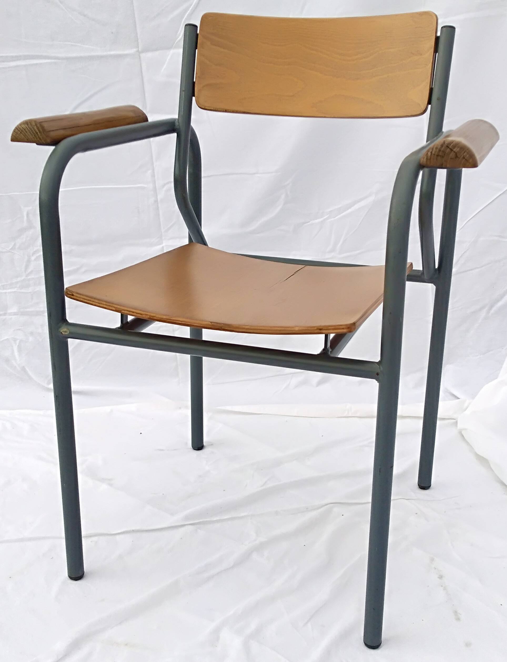 armchair tubular structure wooden seat and armrests