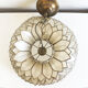 Petal hanging of mother-of-Pearl and brass