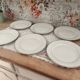 Set of 6 flat plates in fine white Bohemian porcelain with a gold rim.