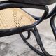Rocking-chair noir canné bois courbé 1930