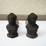 Old cast iron andirons: bust of a woman with a medallion