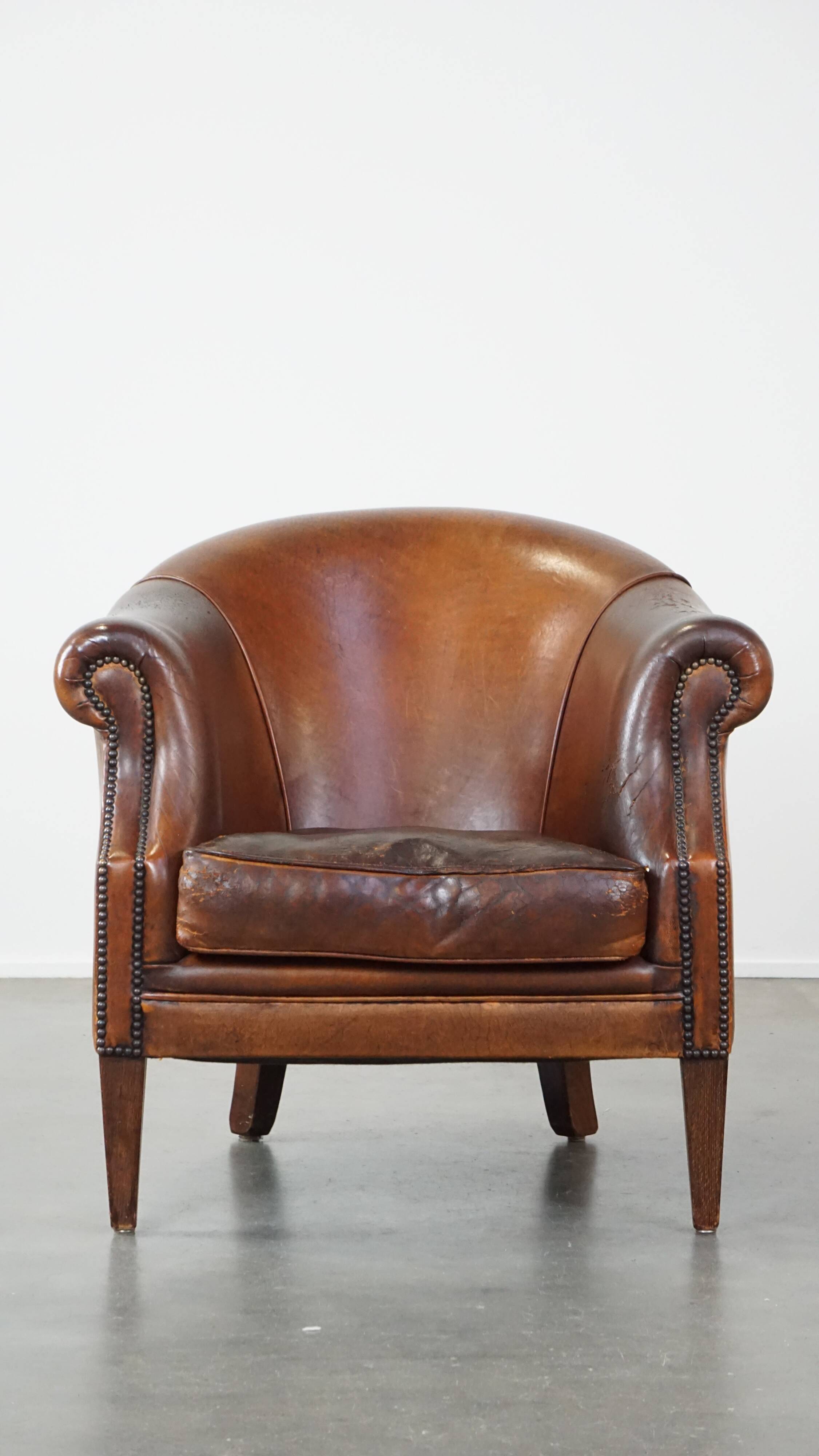 Vintage club armchair in sheepskin leather