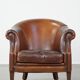 Vintage club armchair in sheepskin leather