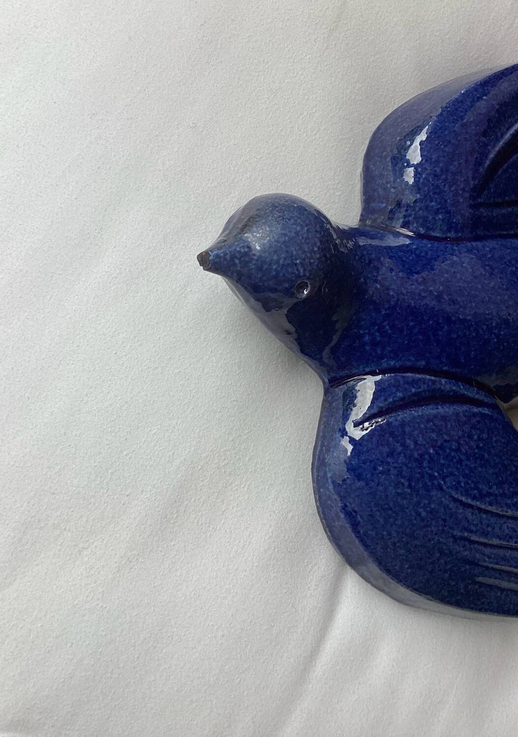 Glazed terracotta swallow clarous