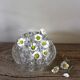 Large round glass flower frog vase with 19 holes.