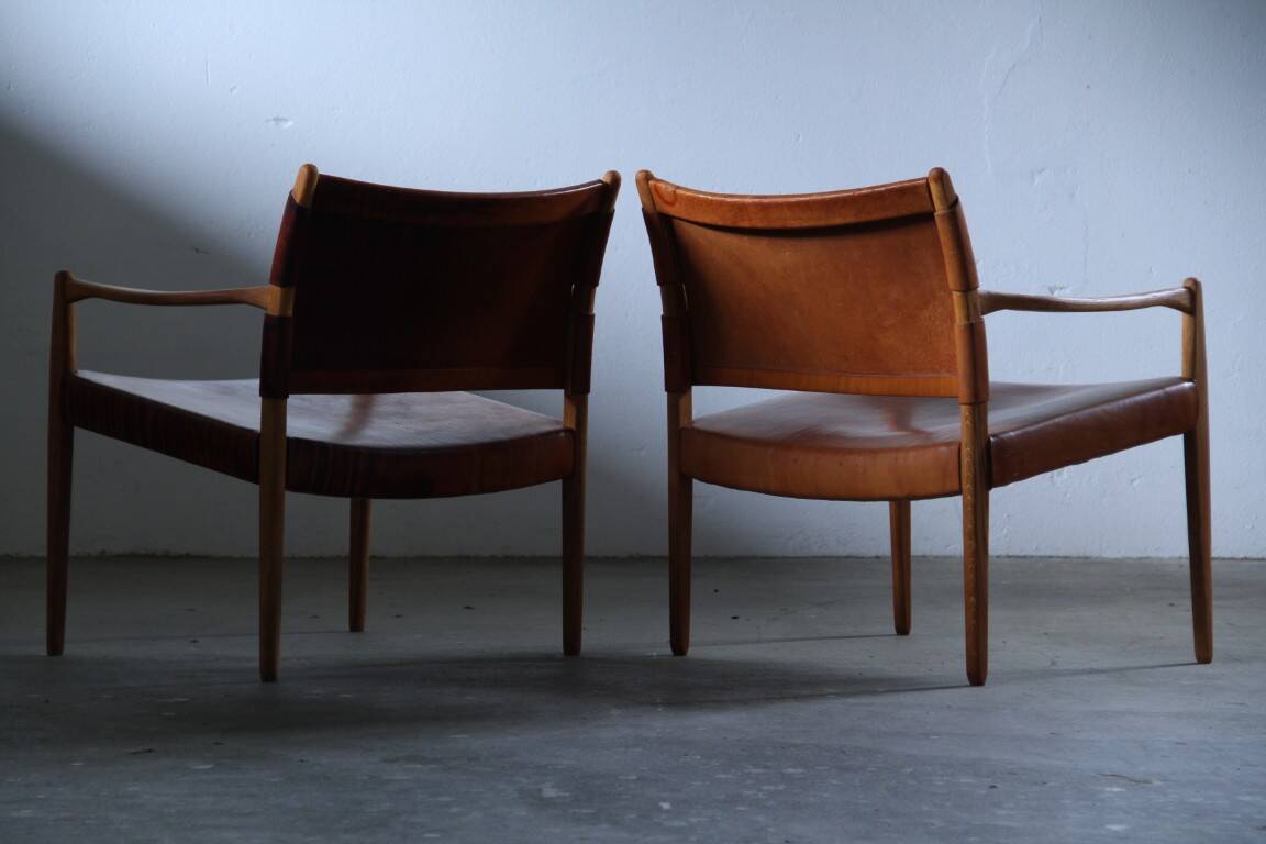 Pair of vintage Per-Olof Scotte "Premier 69" oak armchairs in cognac leather