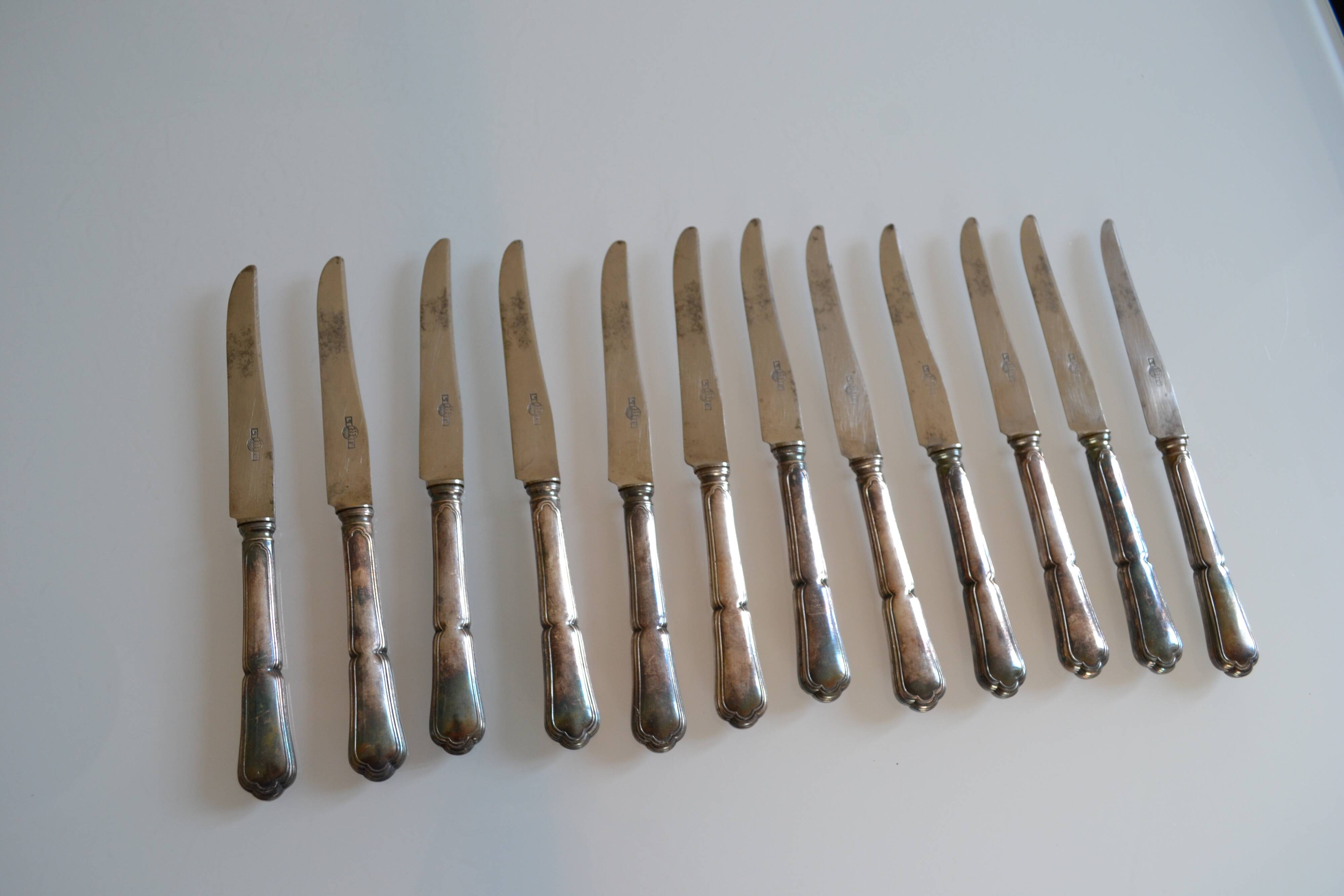 12 silver metal dessert or cheese knives
