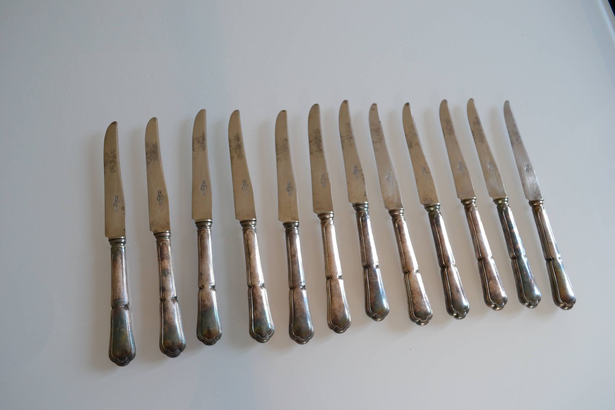 12 silver metal dessert or cheese knives