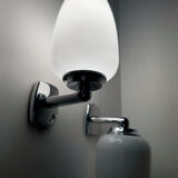 Chrome and opaline wall lights from the 70s.