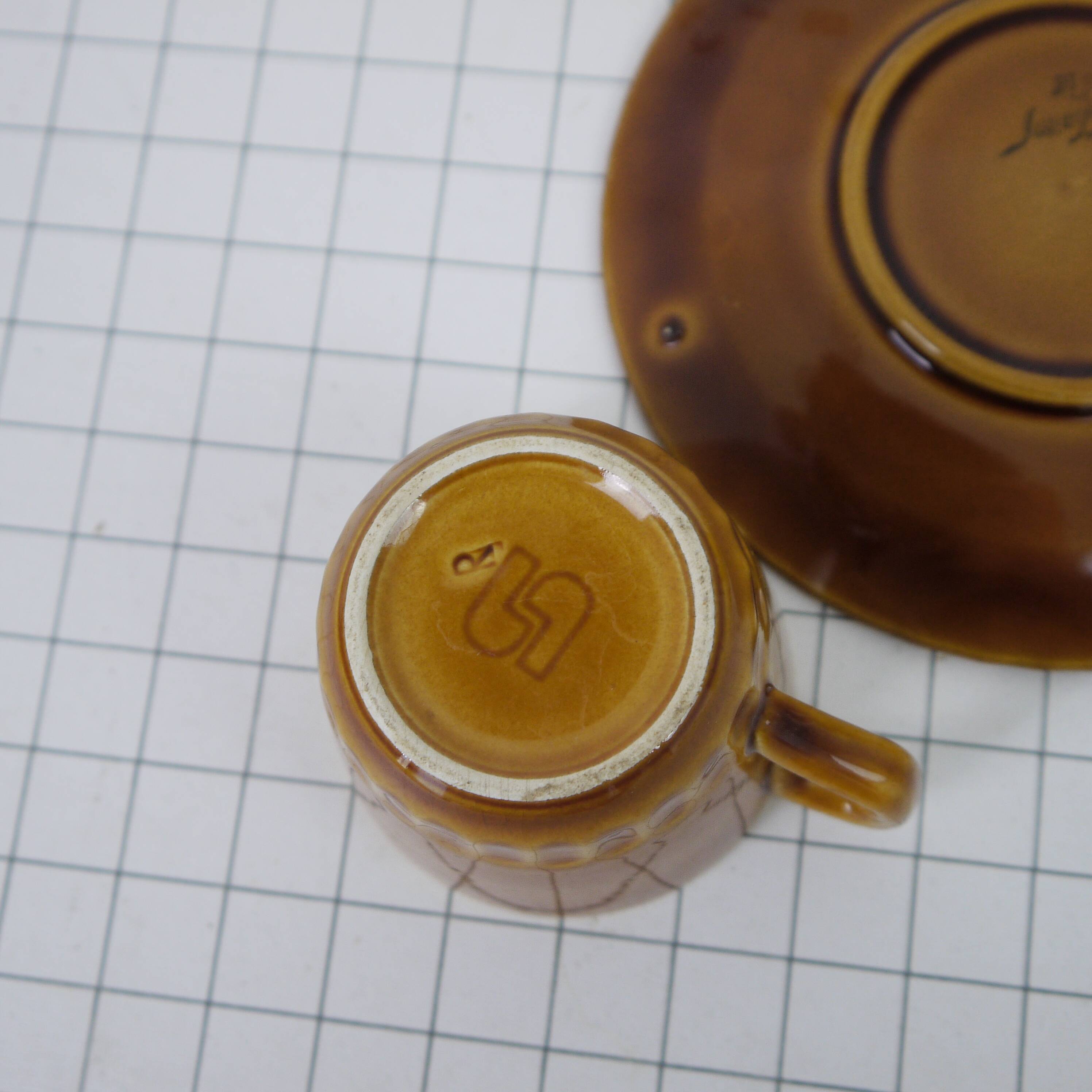 Two Digoin cups and saucers