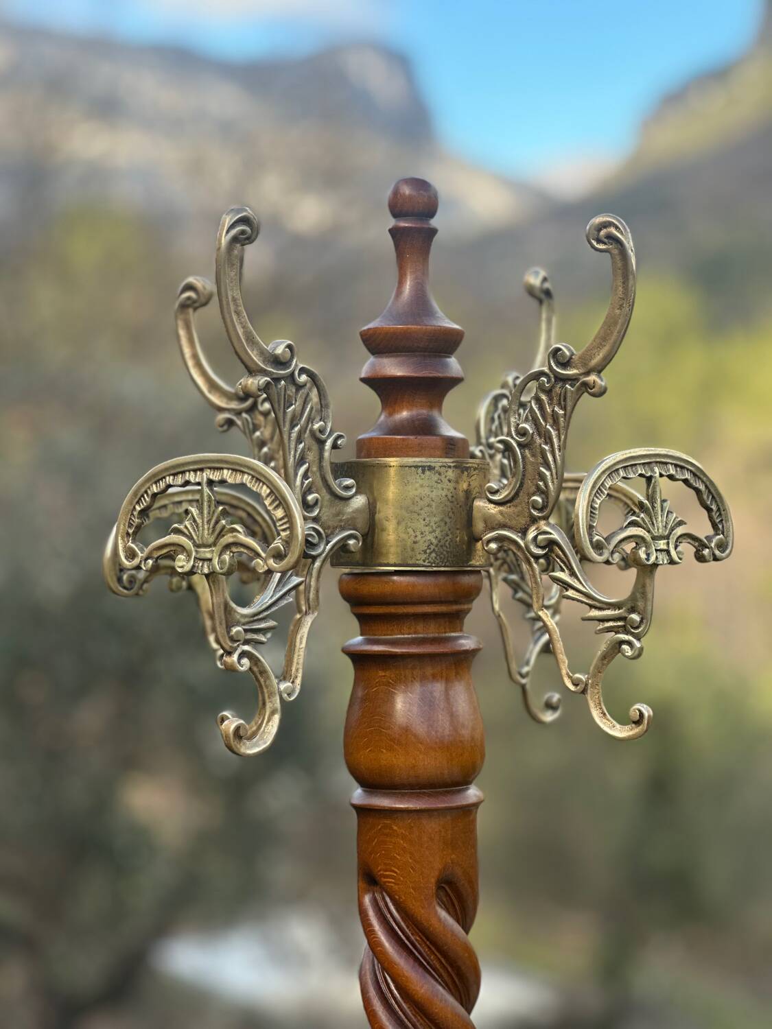 Solid carved wooden coat rack with gilded bronze in Baroque style.