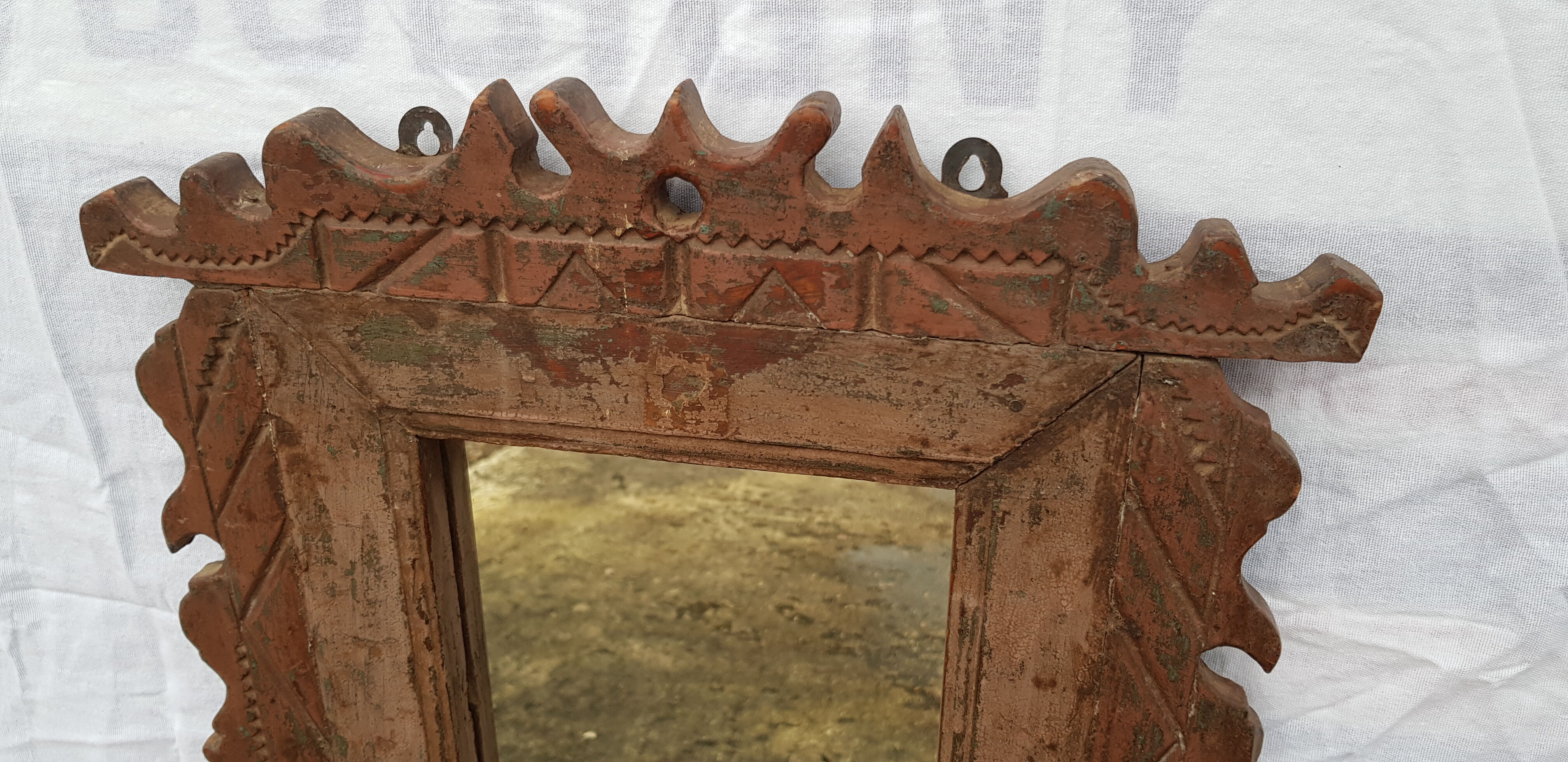 Old barber's mirror in teak