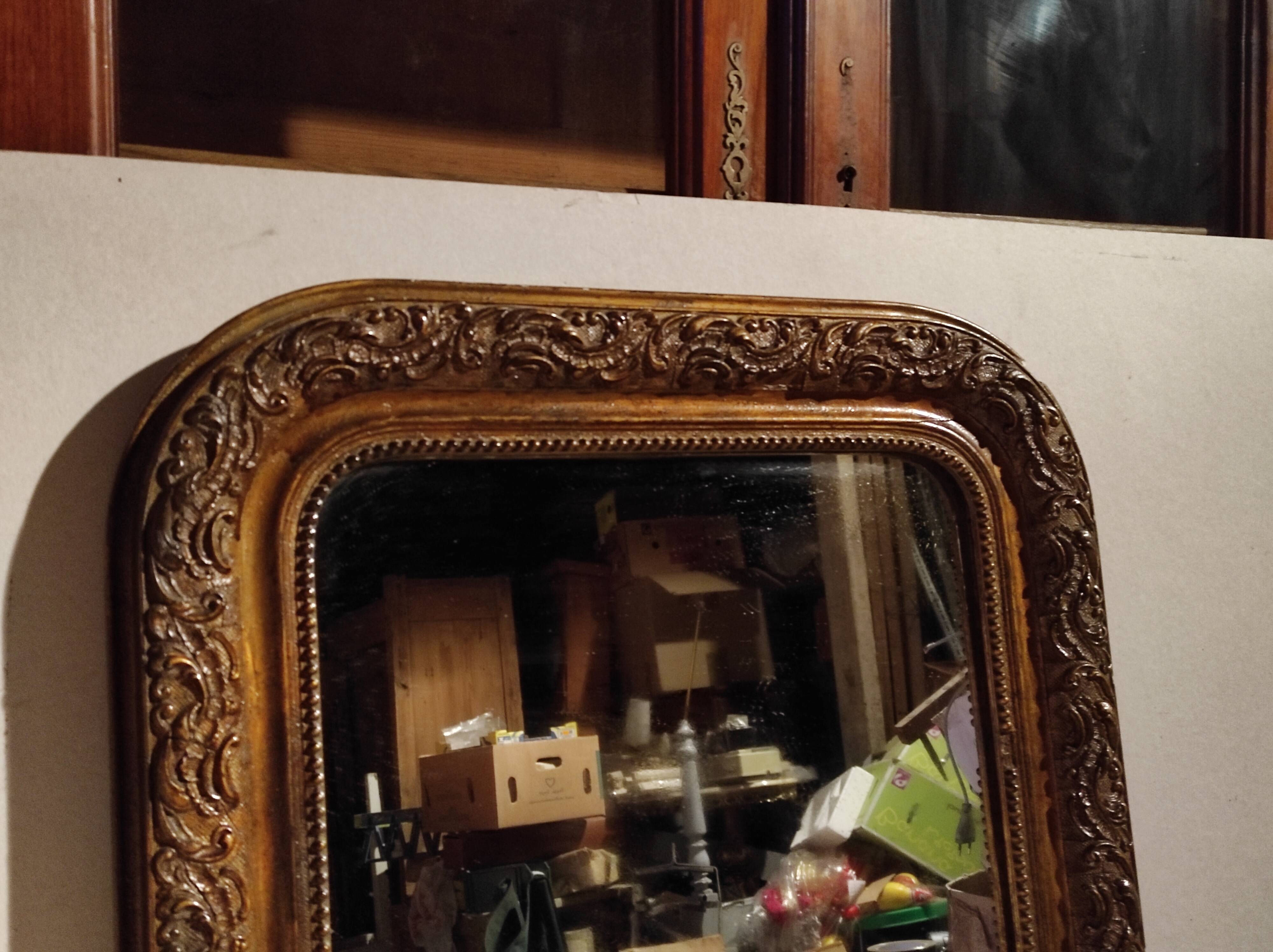 Old Louis Philippe style mirror in wood and plaster with mercury ice cream