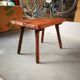Raw hammered side table
