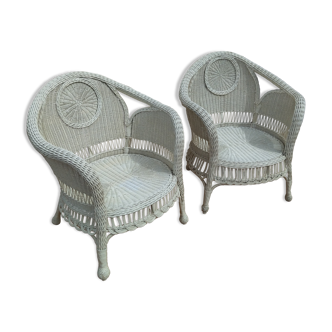Pair of white rattan armchairs