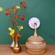 Applique coudée globe vintage en verre granité jaune et or