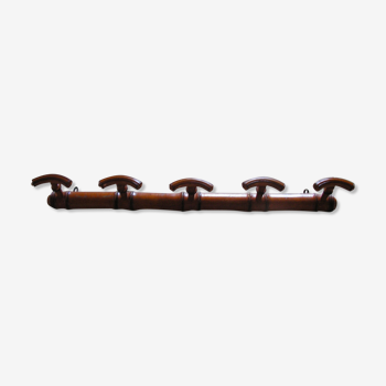 Wooden coat holder has 5 pateres end 19th