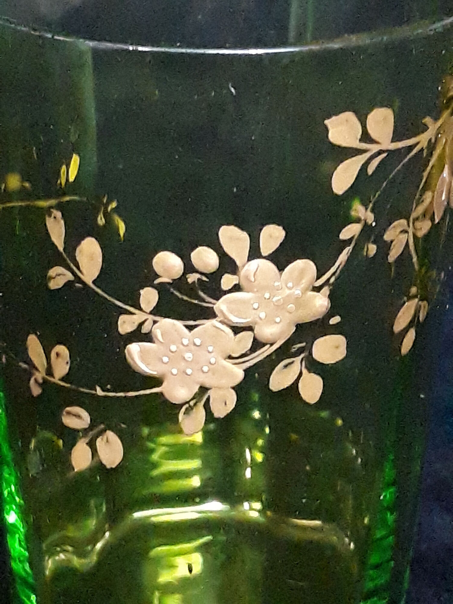 Small carafe and green glass drop glasses with rococo golden emailed decor