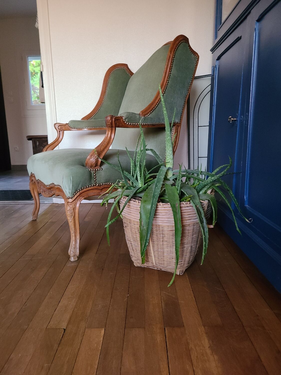 Vintage Louis XV style wing chair, light green velvet