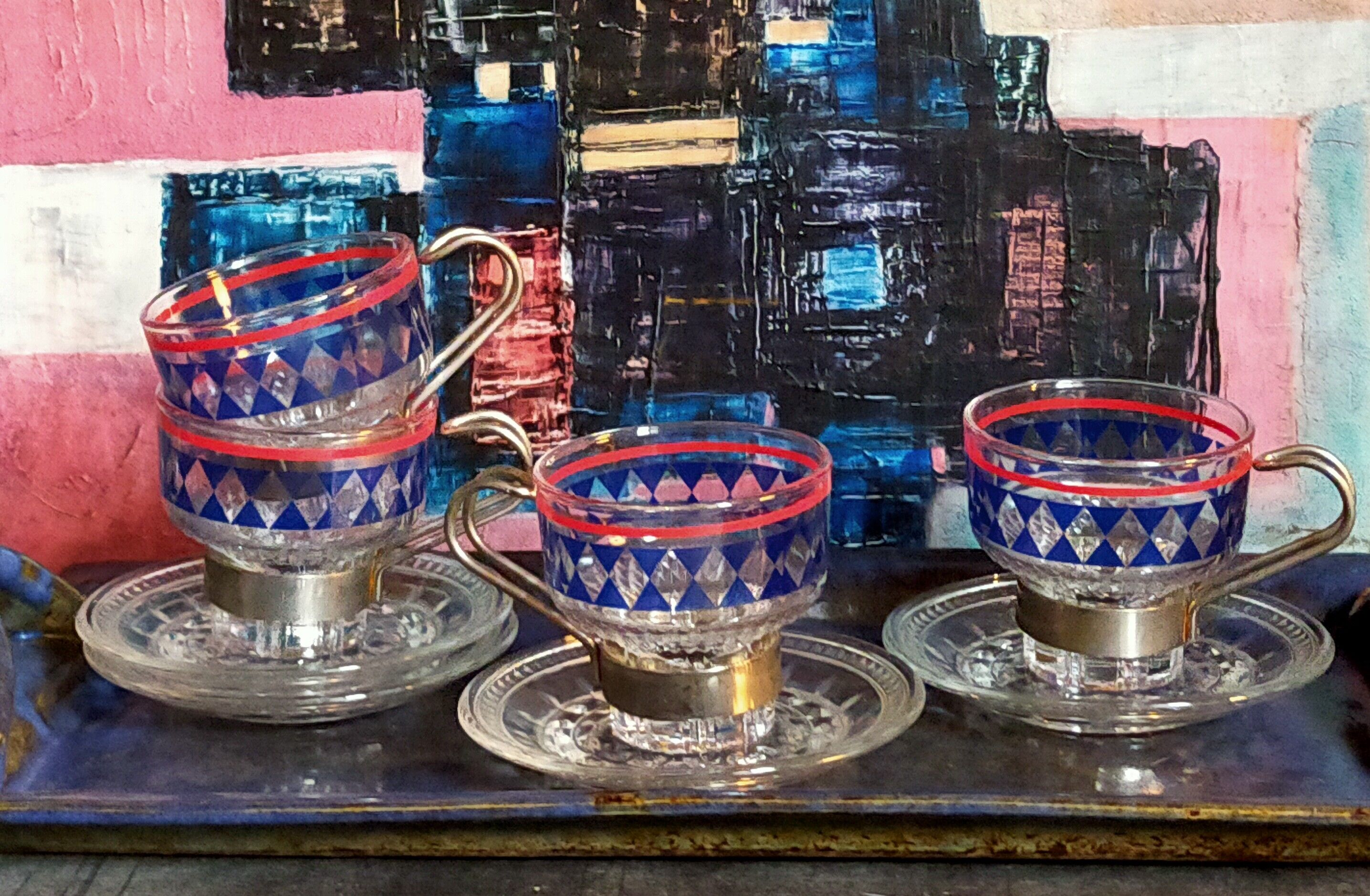 Four vintage coffee cups screen printed glass and metal