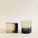 Pair of octagonal black glass whiskey glasses