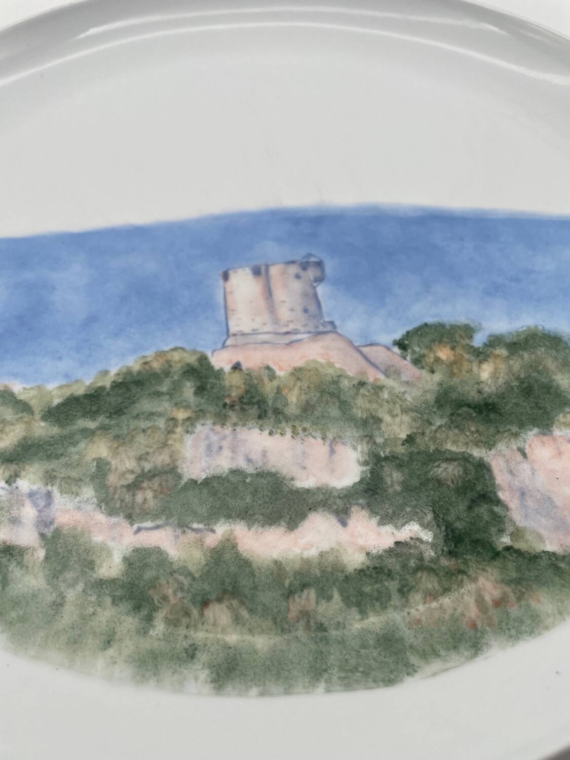 Hand painted porcelain plate with landscape decoration