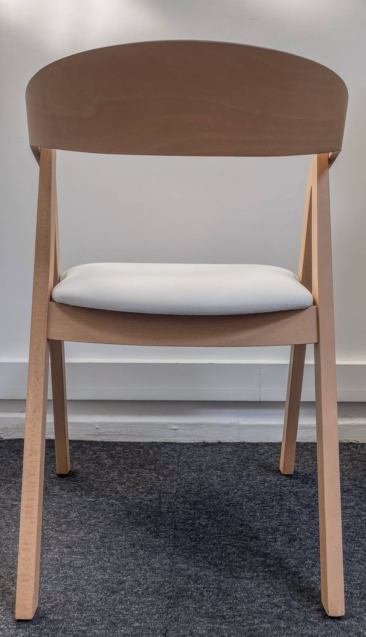 Professional chairs in beech and coated white textile