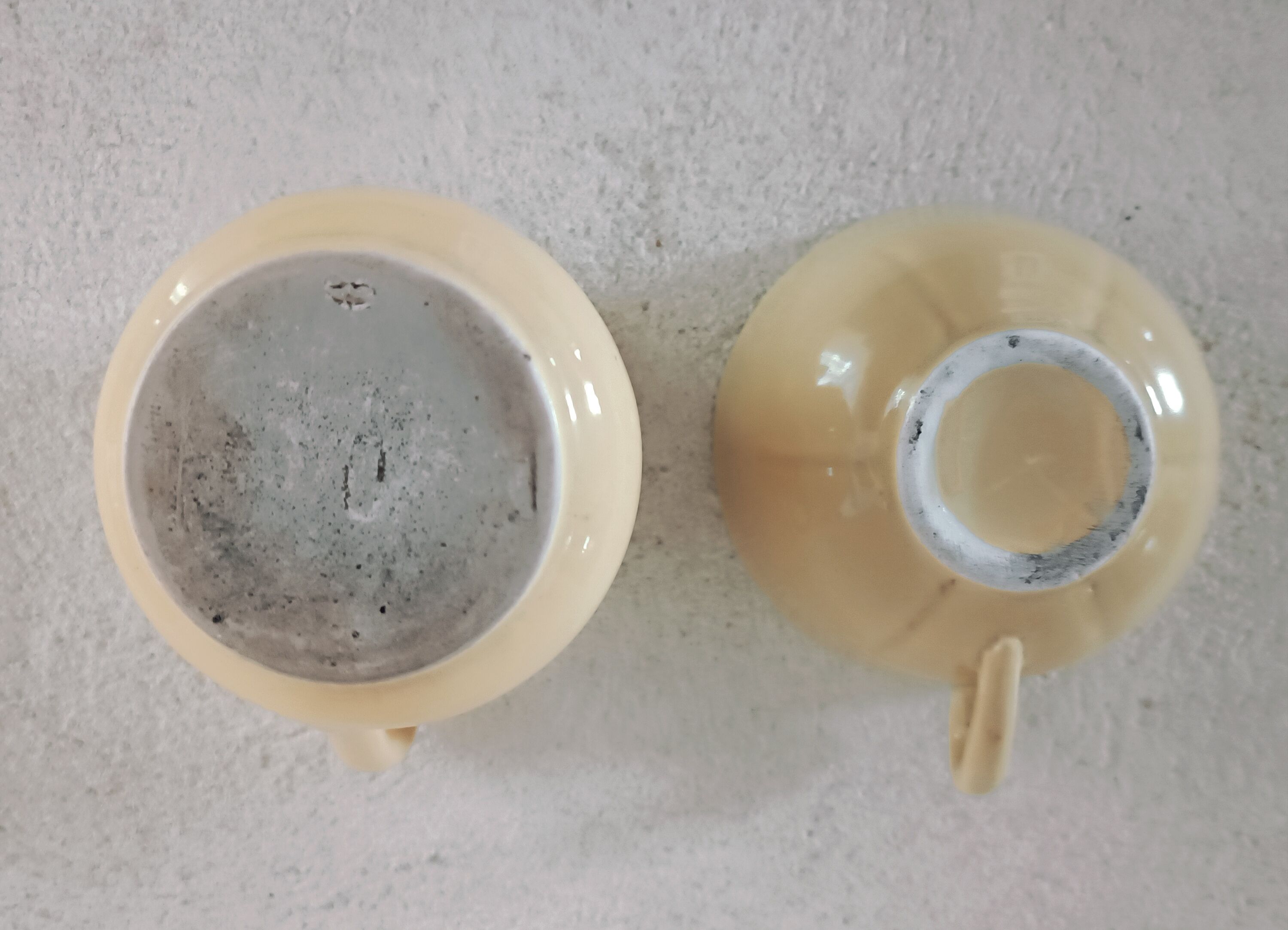 Earthenware cup and milk jar