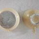 Earthenware cup and milk jar