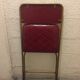 Golden and burgundy chair