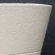 Textured beige cache-pot