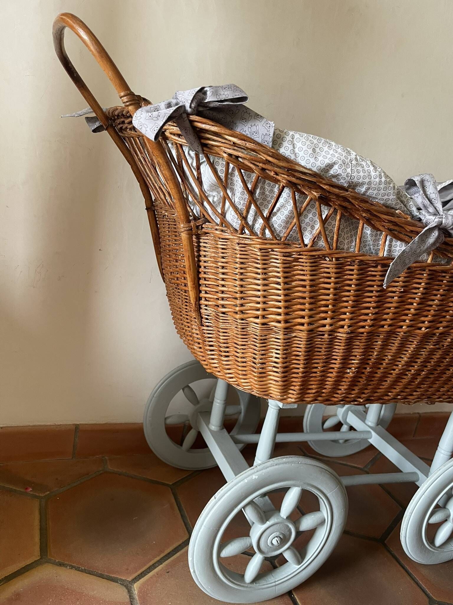 Antique rattan cradle in very good condition. Sold with or without upholstery.