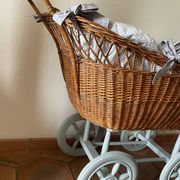 Antique rattan cradle in very good condition. Sold with or without upholstery.
