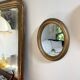Miroir ovale en bois doré, style Napoléon III
