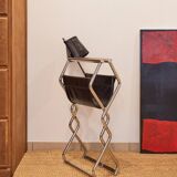Folding cantilever chair in tubular metal