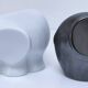 Two iridescent black and white ceramic elephants design
