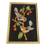 Vintage tapestry framed birds on black background