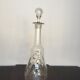 Art Deco stylized flowers carafe with its cap