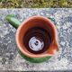 Terracotta pitcher glazed in grape slip signed HB