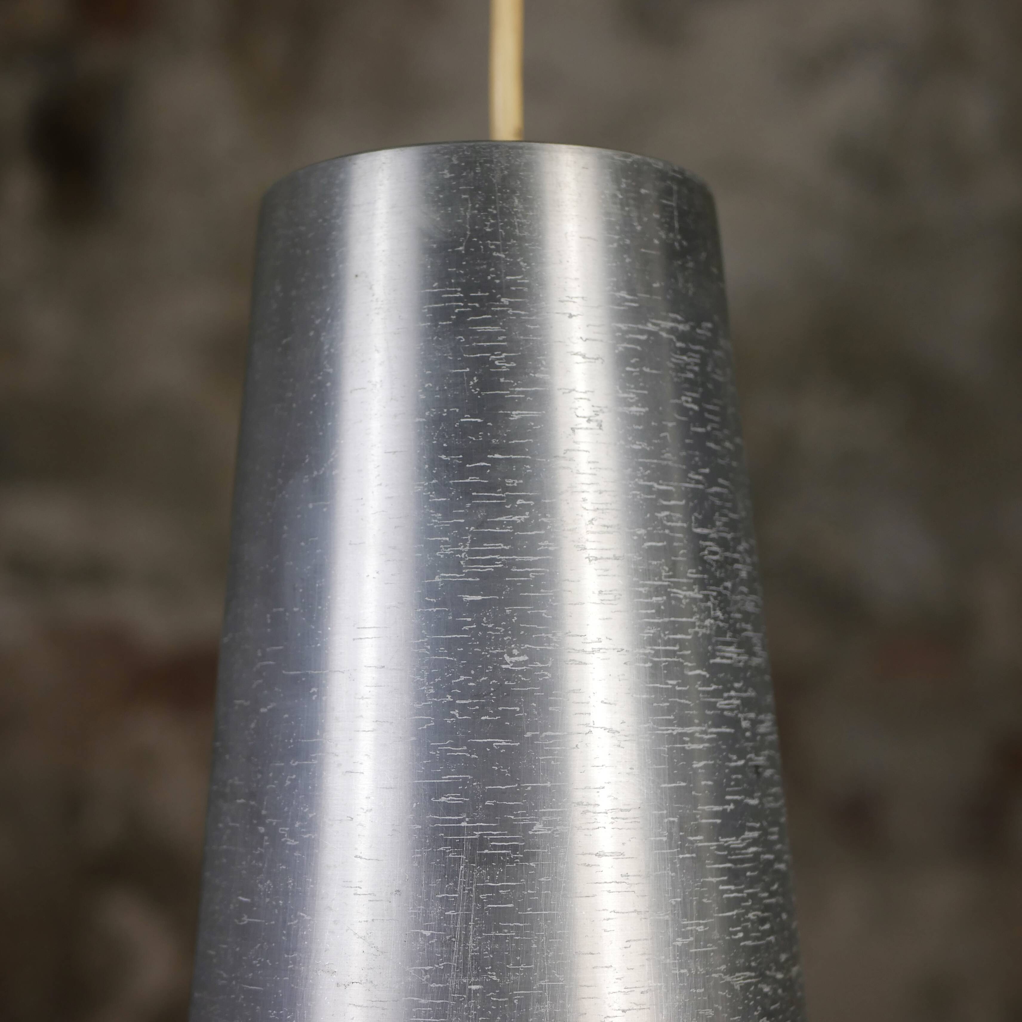 Trio of Raak steel pendant lights, 1960s