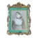 Old wooden frame and bronze ornament