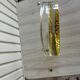 Empty round pockets of iridescent transparent glass of yellow sticks