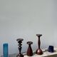 Trio of large turned wooden candlesticks