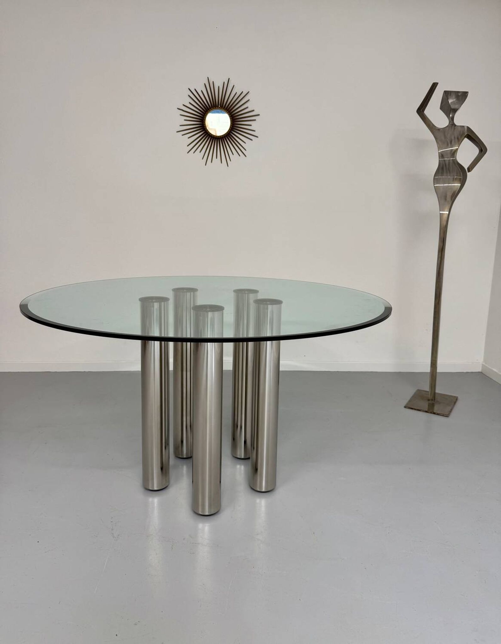 Round glass and metal dining table, Italian design from the 80s, vintage