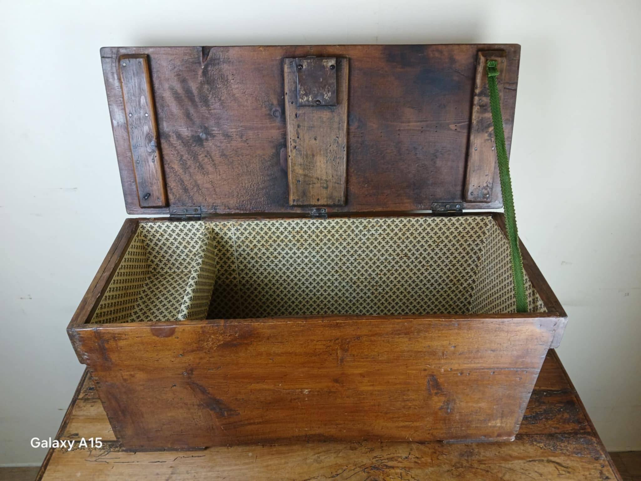 Old solid wood transport chest from the early 19th century