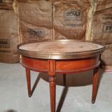 Marble and cherry hot water bottle table