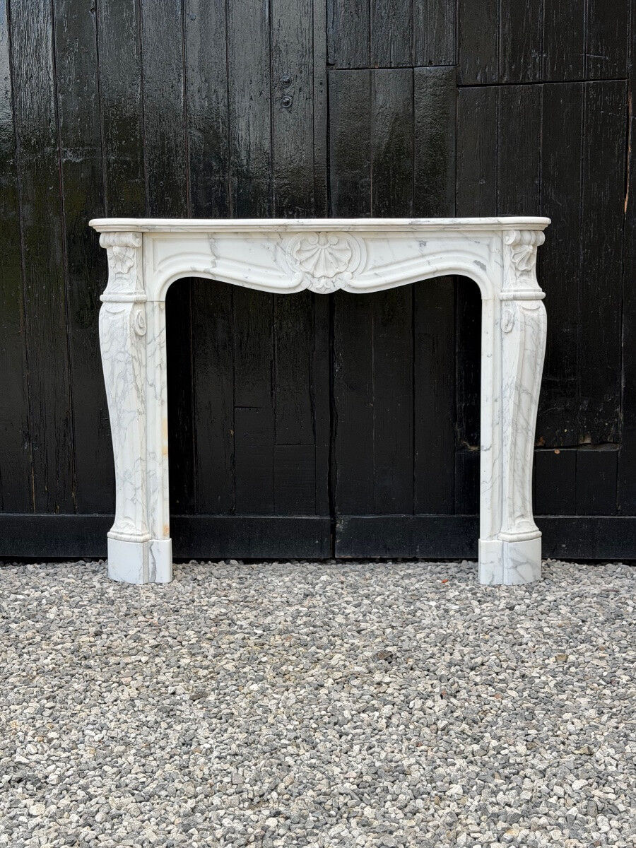 Louis XV style fireplace in Arabescato Carrara marble, circa 1880.