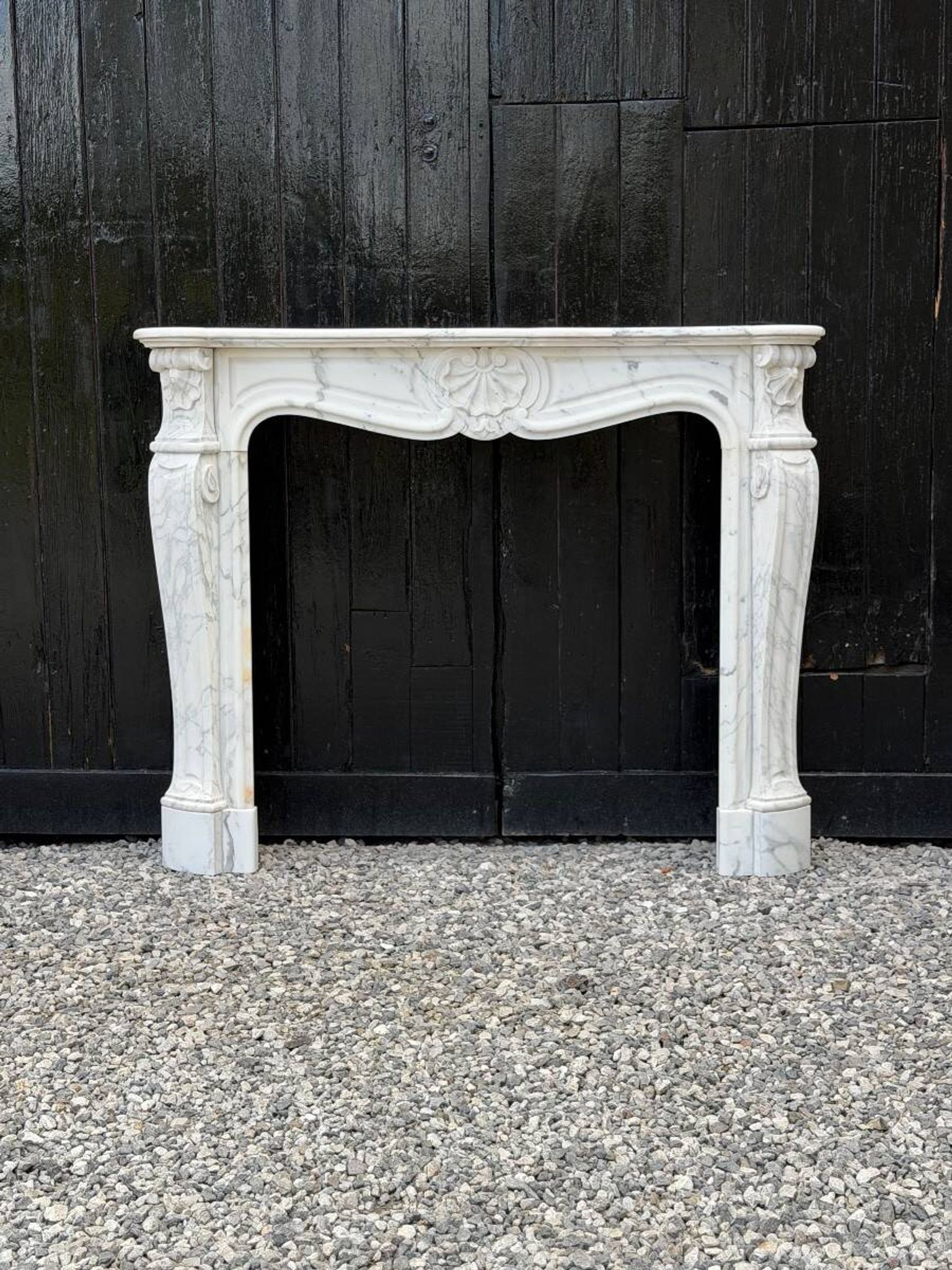 Louis XV style fireplace in Arabescato Carrara marble, circa 1880.
