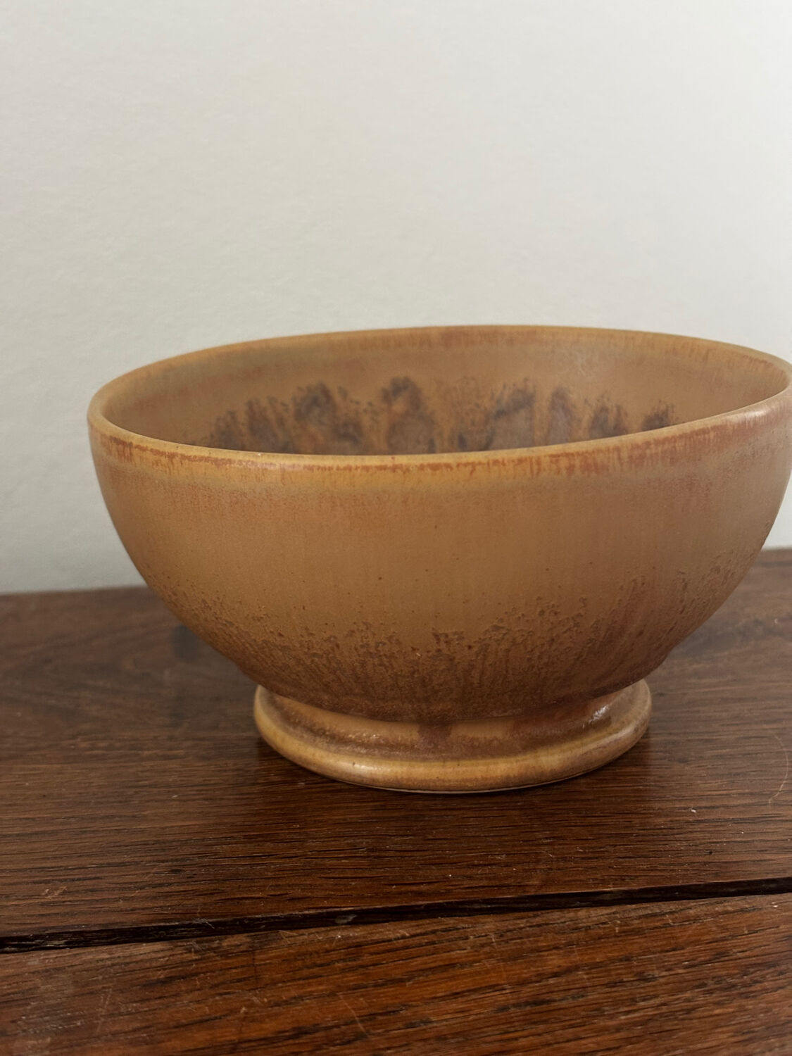 Vintage stoneware bowl on a vintage stand.