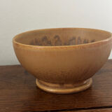 Vintage stoneware bowl on a vintage stand.